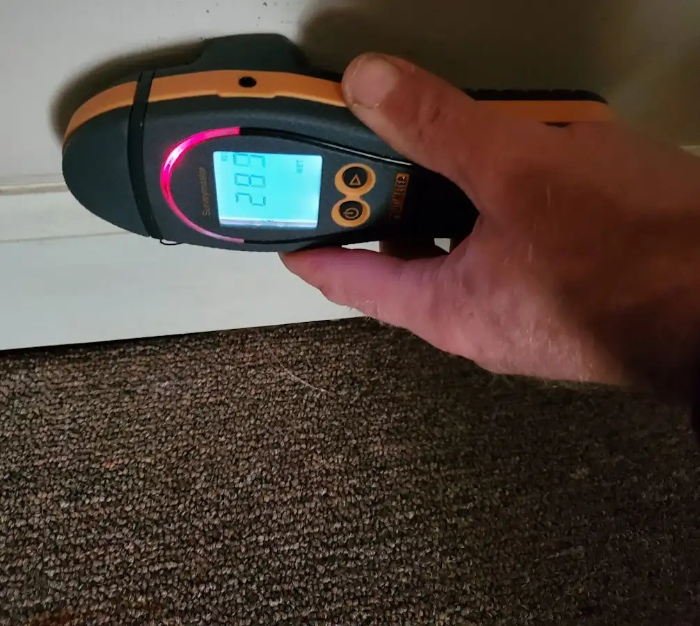 Moisture detection at baseboard during Burst Pipe Cleanup in Village of Oak Creek (Big Park)